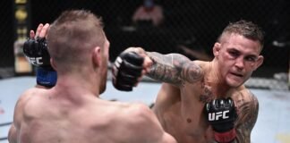 Dustin Poirier punches Dan Hooker at UFC on ESPN 12
