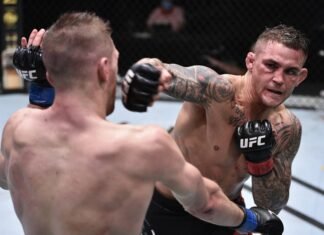 Dustin Poirier punches Dan Hooker at UFC on ESPN 12