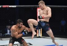Grant Dawson (right) launches a flying knee at Nad Narimani, UFC Fight Island 2