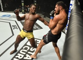 Abdul Razak Alhassan of Ghana punches Mounir Lazzez UFC Fight Island 1