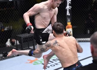 Cory Sandhagen hits Franke Edgar with a flying knee at UFC Vegas 18